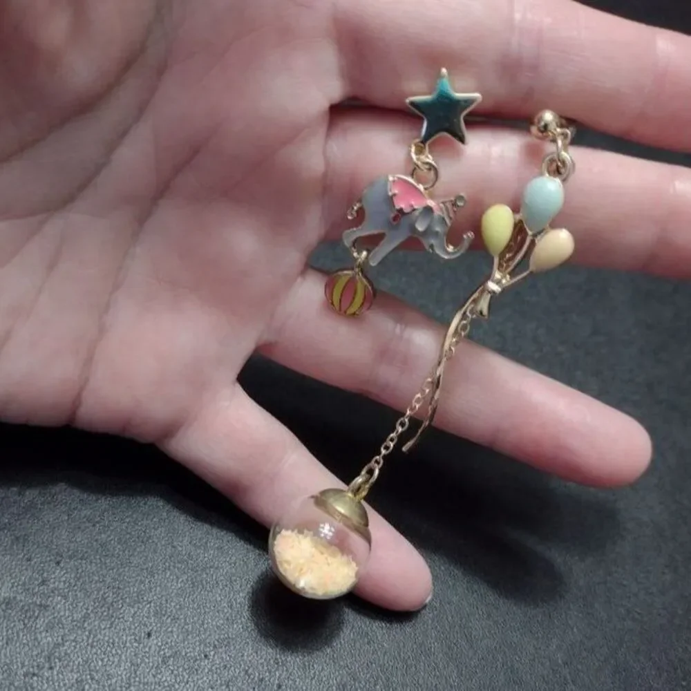 Circus high low earrings